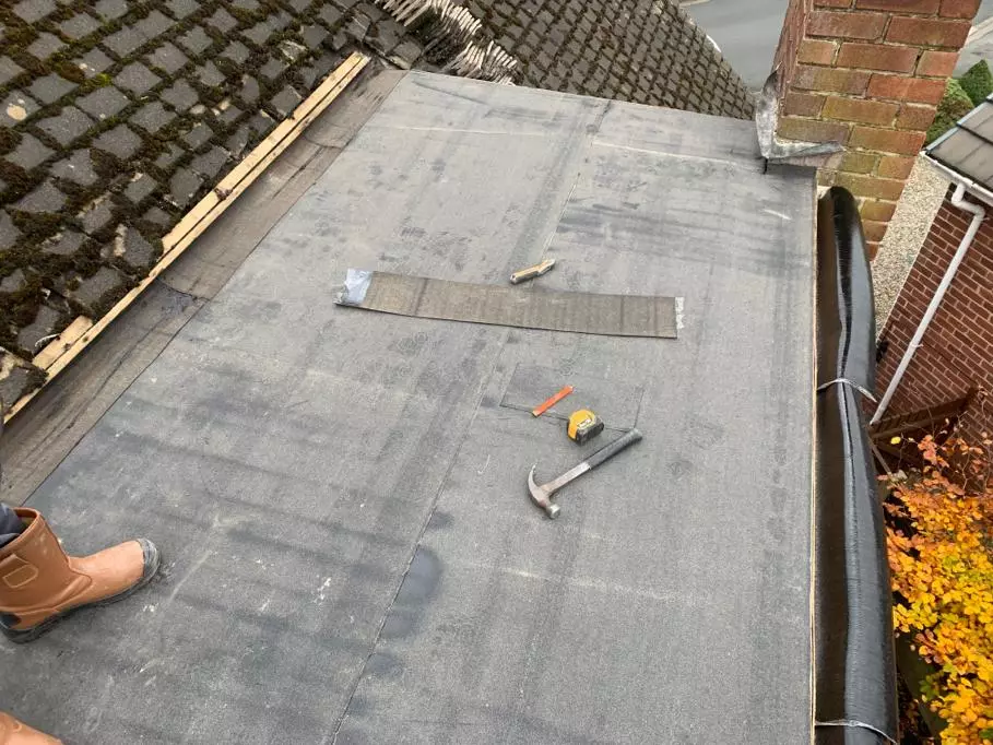 flat roof repair in progress
