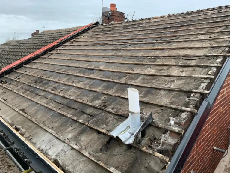 Old slate roof with a sagging slope