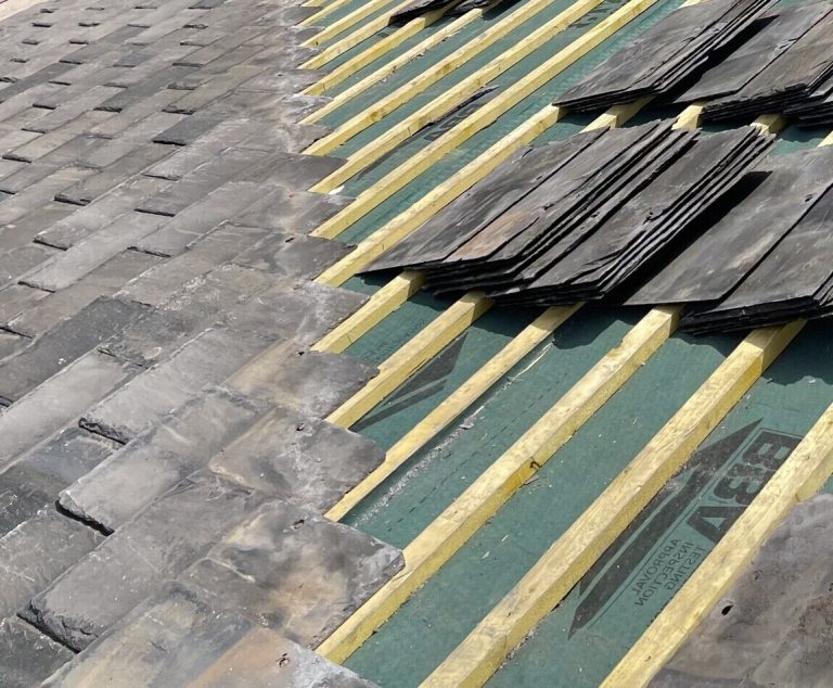 Re-slating a roof over new battens and membrane